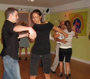Kyle and Dance instructor dancing rumba.