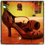 Salsa dance shoes in Brooklyn dance studio.